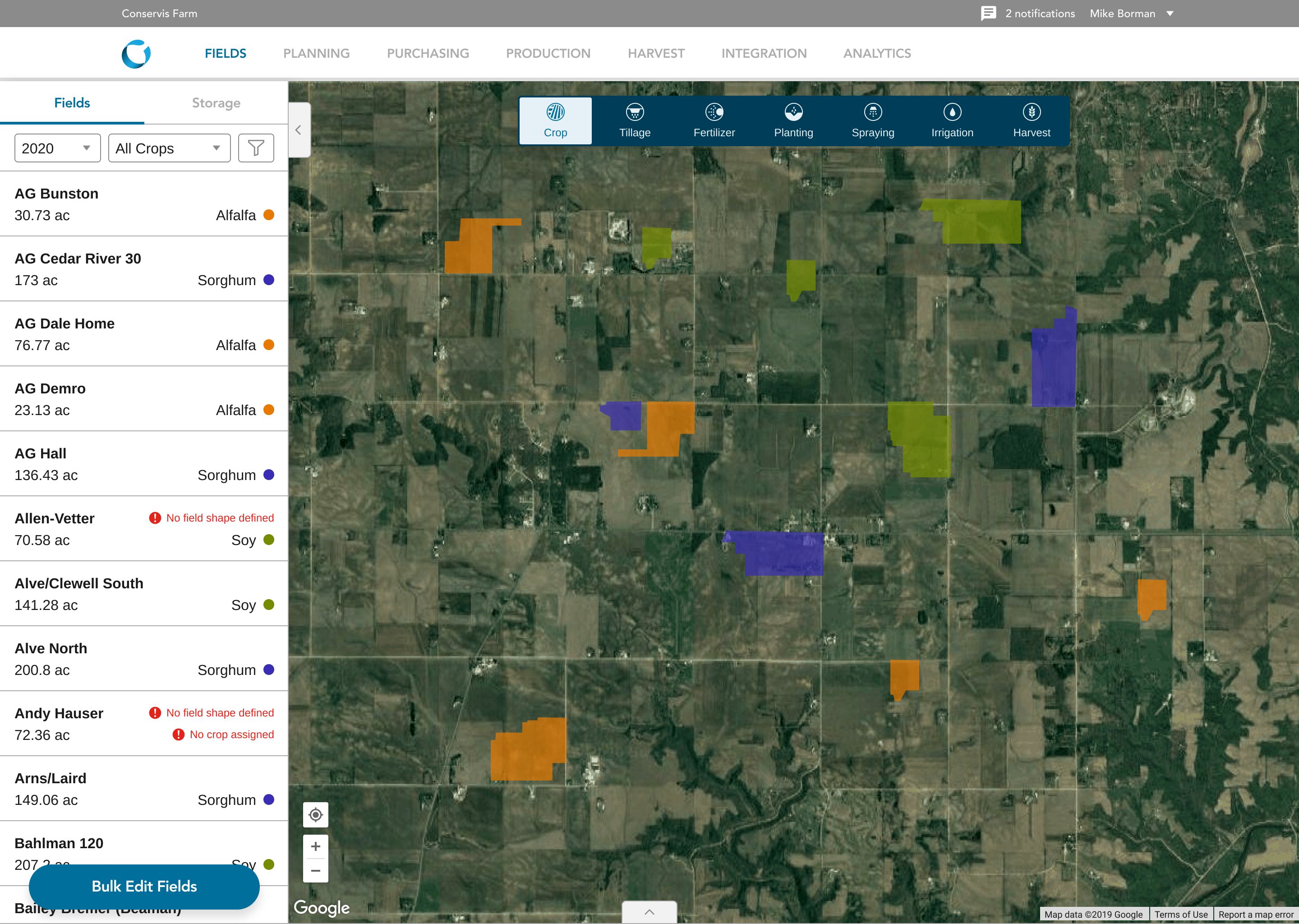 Conservis fields view: a satellite map with crop-coded field shapes beside a filterable field list