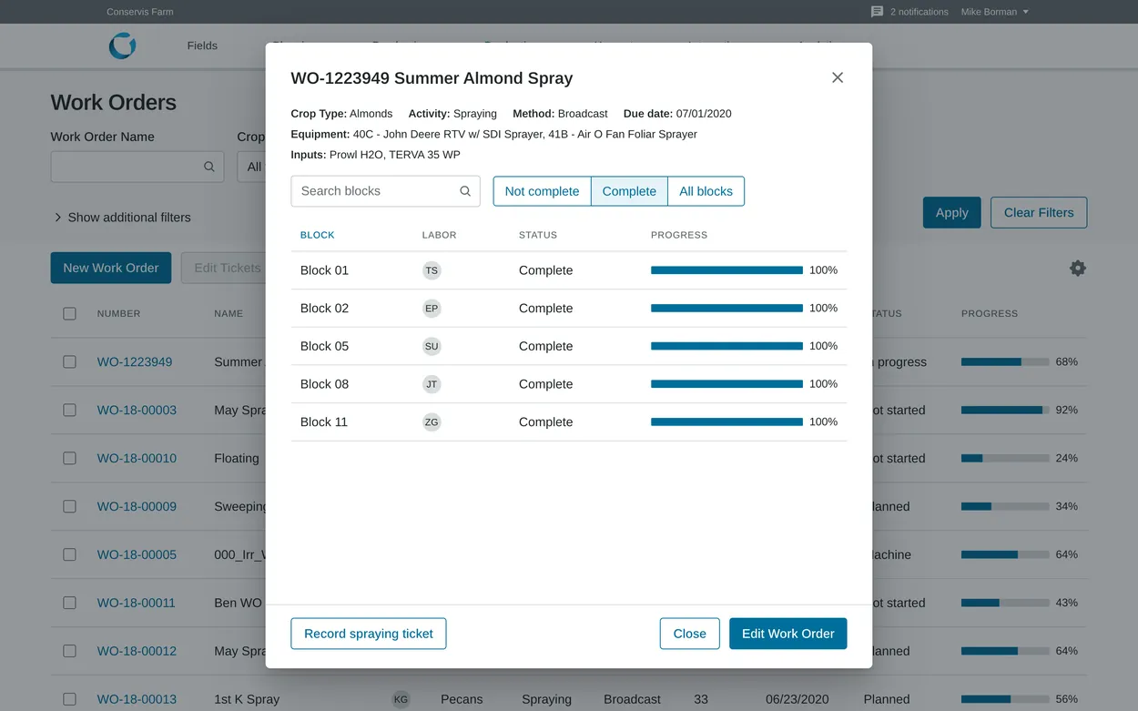 Conservis work order dialog for a summer almond spray, filtered to five complete blocks at 100 percent progress
