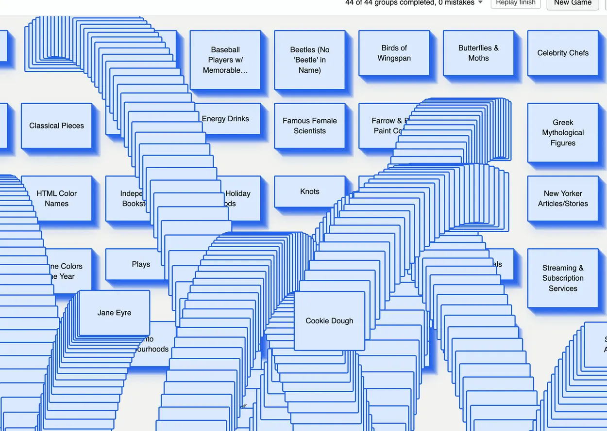 Two by Four on desktop, with blue word cards cascading in arcs across the board under a Finished card reading 44 of 44 groups